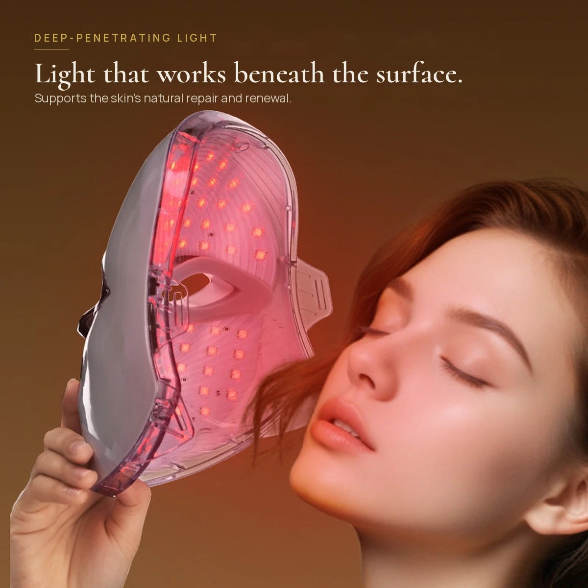 Aura Glow Pro LED mask held to the face, deep-penetrating light therapy