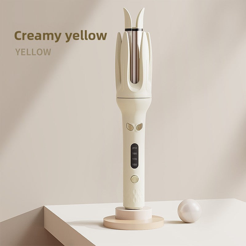 Aura Wave automatic hair curler showing rotating styling design